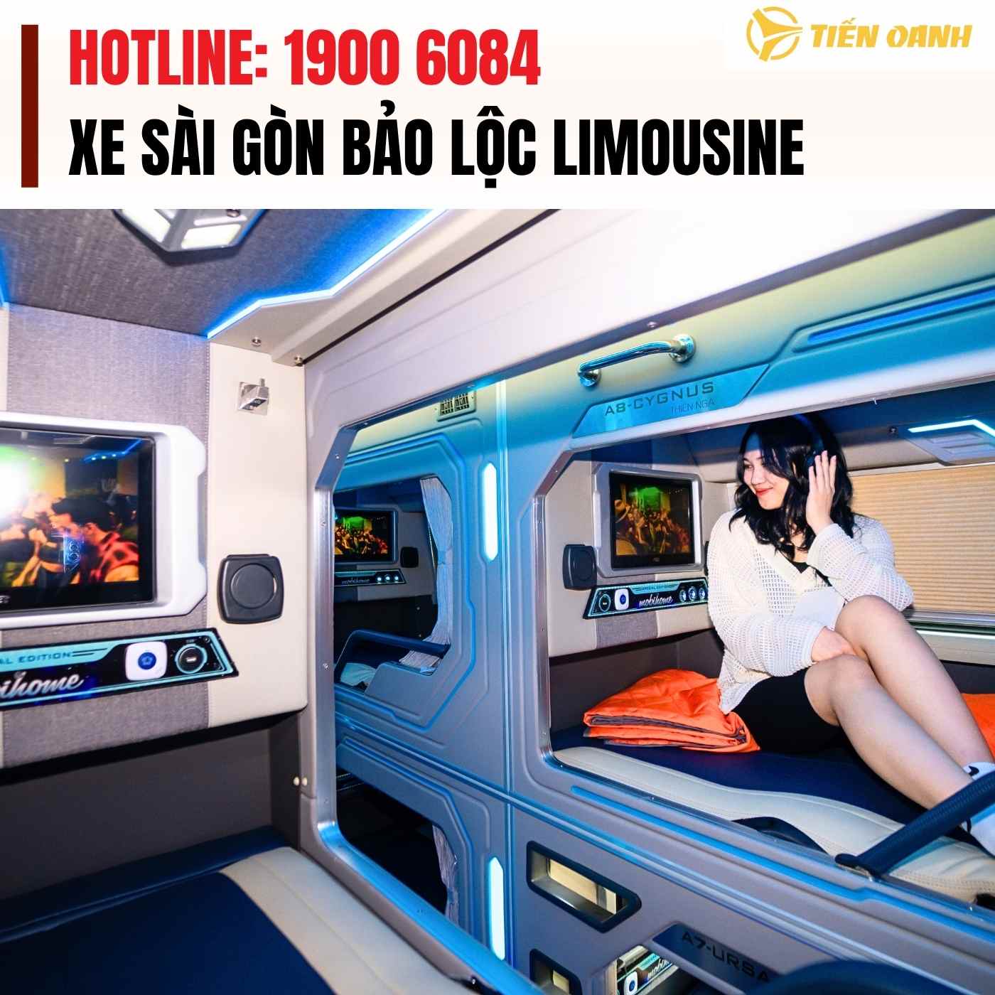 Luxurious bus interior with entertainment system.
